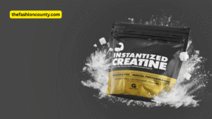 Scoop of instantized creatine powder mixing into water with clear texture