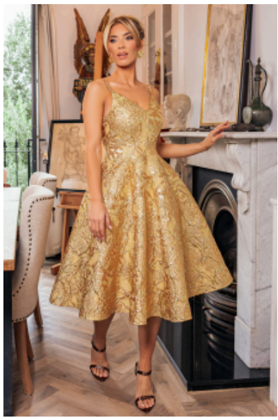 A elegant silk midi dress in a soft pastel color, perfect for semi-formal wedding guest attire.